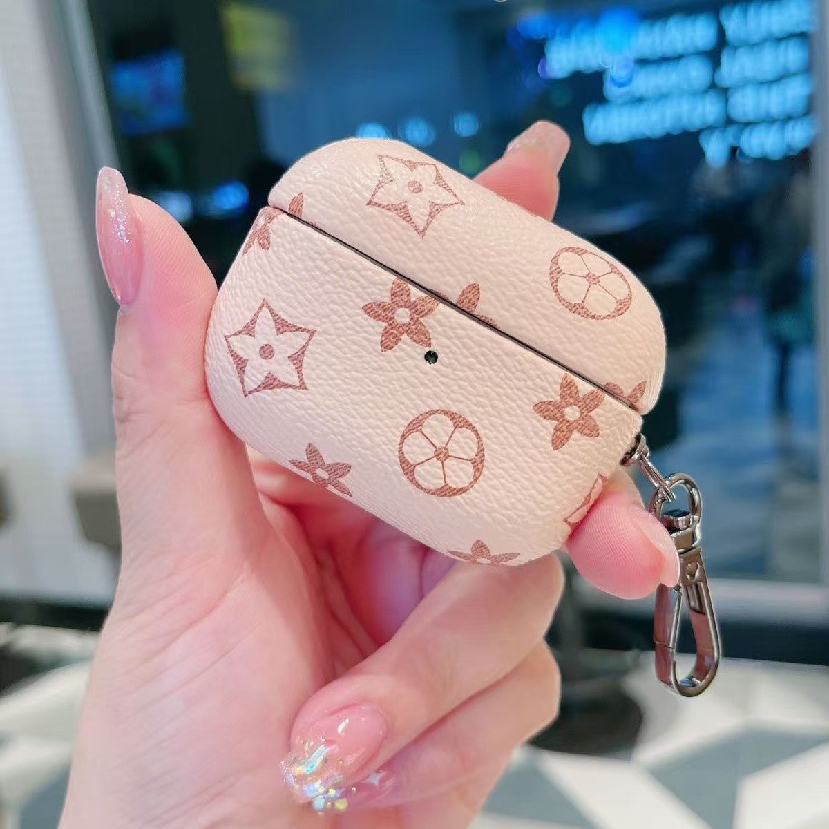 Timeless Elegance: Vintage Monogram AirPods Case