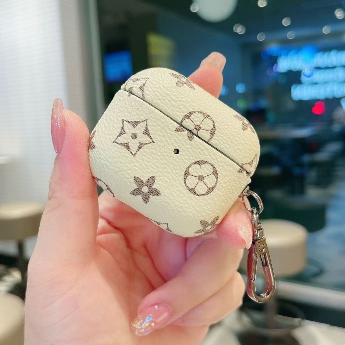 Timeless Elegance: Vintage Monogram AirPods Case