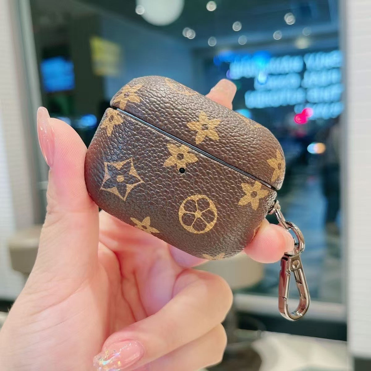 Timeless Elegance: Vintage Monogram AirPods Case